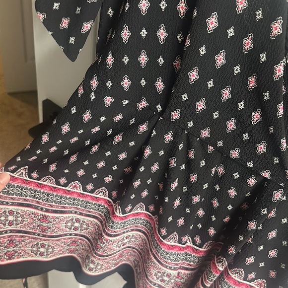 New. Never worn romper. With tags - Picture 3 of 3